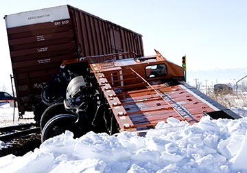 Derailed trains and trains involved in weather-related accidents like this one sometimes injure railroad employees. Contact a Kenner railroad accident attorney today to discuss your injuries.